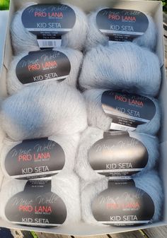 six skeins of yarn in a box