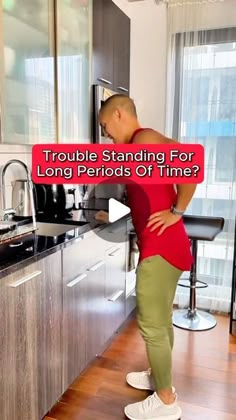 a man standing in front of a kitchen counter with his hands on his hips and the words trouble standing for long periods of time?