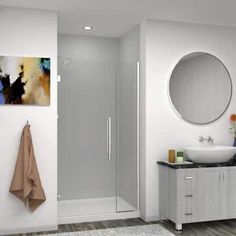 a bathroom with a sink, mirror and shower stall in the middle of the room