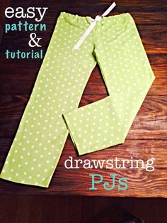 a pair of pants with the words easy pattern and drawing on it, sitting next to a