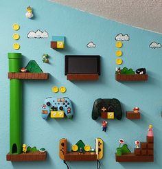 the nintendo wall is decorated with mario and luigi's game controllers, video games, and other items