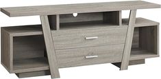 an entertainment center with two drawers and one shelf on the bottom, in grey oak