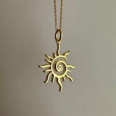 Yellow Gold Swirl Jewelry Gift, Swirl Shaped Yellow Gold Jewelry Gift, Sun Themed Clothes, Hand Forged Spiral Jewelry Gift, Spiral Brass Necklace For Gift, Gold Spiral Necklace Nickel Free, Gold Spiral Nickel-free Necklace, Nickel-free Gold Spiral Necklace, Wire Sun Pendant