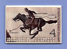 an old postage stamp with a man on a horse