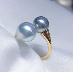 Beautiful Double Pearl Ring, South Sea White Pearl Tahitian Gray Green Pearl, 8mm-9mm, Beautiful Silvery Blue White with Pastel Gray Green Color, Very High Luster. Solid 18K Yellow Gold, Very Well made and Comfortable to wear. Open End Ring, fit US size 5-9.  Classic and Elegant   Lustrous Beauty  Pearl ★ Pearl: Genuine South Sea White Pearl (Australia), Tahitian Pearl (Tahiti)  ★ Size: 8mm-9mm ★ Shape: Round ★ Color: Natural untreated, Beautiful Silvery Blue White with Pastel Gray Green Color, Blue Pearl Ring, Pastel Gray, Clean Rings, Silvery Blue, Gold Pearl Ring, Pastel Grey, Green Pearls, Tahitian Pearls, Blue Pearl