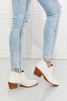 We've fallen in love with these crossover cowboy booties, which have a 2.5 inch stacked heel for a cowboy-chic look. Pair with a denim maxi skirt or cute crop jeans and a printed top for a trendy ensemble. Size fit: True to size Pattern type: Solid Type: Ankle boots Toe: Point toe Heel height: Low heels Heel shape: Block heels Material: PU leather /Wood sole Imported Product measurements: Heel height: 2.5 inchMMShoes has made a name for itself in European and Asian markets through footwear trade Cowboy Chic, Fallen In Love, Denim Maxi, Denim Maxi Skirt, High Quality Shoes, Pointed Toe Heels, Jeans Rock, Crop Jeans, Size Pattern