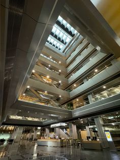 the inside of a large building with many windows