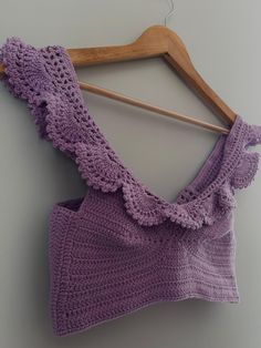 İngilizce: "Where elegance meets originality: handmade purple crochet bustier! Its striking purple color brings out your vibrant energy, while its soft texture ensures both comfort and style. Perfect for casual outfits or special occasions, this unique design will add a distinctive touch to your wardrobe. The perfect choice to make you feel special in every setting!" Türkçe: "Zarafetin ve özgünlüğün buluştuğu el yapımı mor örgü büstiyer! Göz alıcı mor rengiyle enerjinizi ortaya çıkarırken, yumuşak dokusu sayesinde hem rahat hem de şık bir deneyim sunar. Hem günlük kombinlerde hem de özel anlarınızda size eşlik edecek bu tasarım parça, stilinize benzersiz bir dokunuş katacak. Kendinizi her ortamda özel hissetmek için mükemmel bir seçim!" Crochet Bustier, Purple Crochet, Feel Special, Jumpers And Cardigans, Soft Texture, Cardigans For Women, Purple Color, Sweater Outfits, Make You Feel