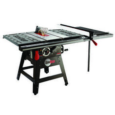 a table saw is on top of a workbench with two tools attached to it