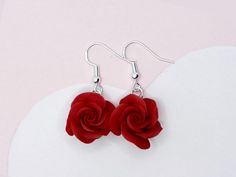 life-like rose earrings sculpted from top quality clay with nickel-free metalware Roses Accessories, Clay Rose Earrings, Handmade Rose Red Flower Earrings, Rose Red Flower Drop Earrings, Red Rose Earrings, Pink Rose Earrings, Rose Earring, Elegant Rose Red Flower-shaped Earrings, Rose Red Flower-shaped Earrings With Rose Design