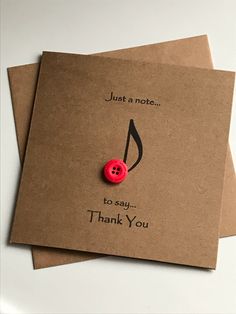 two thank cards with a red button on the front, and just a note to say thank you