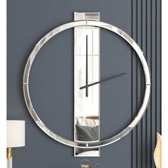 a clock that is on the wall in front of a door with a glass window