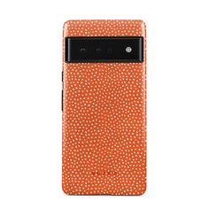 an orange case with white dots on it