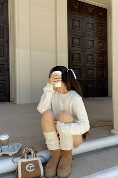 Oversized sweater, neutrals, uggs outfit, leg warmers, cream colored outfit, fall 2024 outfit Sand Uggs Outfit, Slouch Socks Outfit, Leg Warmers Aesthetic, Leg Warmer Outfit, Leg Warmers Outfit, Uggs With Bows, Sheer Leggings