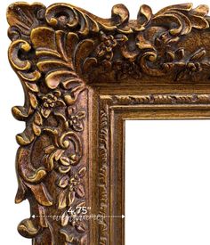 an ornate gold frame with flowers and leaves on the edges is shown in this image