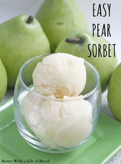 a bowl filled with ice cream next to pears on a green tray and the words, easy pear sorbet