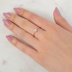 Our delicate Rose Quartz Ring features a pink natural gemstone in a gold filler or sterling silver setting! Rose Quartz is the birthstone for all our October-born babes. Don't know your ring size? Ring Size Guide or Buy Ring Sizer …………………………………. Details: Stone is Natural Rose Quartz, measuring 5mm Available in 14k Gold Filled or Sterling Silver Waterproof and can be worn everyday Size Inclusive and made to order About Your Jewelry If you are not wearing your jewelry it is best to store it in a c Dainty Rose Gold Crystal Ring In 14k Gold, Rose Gold 14k Opal Ring Gift, Everyday Rose Gold Round Birthstone Ring, Dainty Solitaire Rose Gold Stackable Rings, Rose Gold Gemstone Pearl Ring Gift, Rose Gold Pearl Ring Gemstone Gift, Rose Gold Pearl Ring With Gemstone For Gift, Dainty Pink Gold Jewelry For Everyday, Delicate Stackable Rose Gold Birthstone Ring