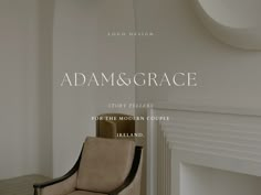 a chair sitting in front of a fireplace next to a wall with the words adam and grace written on it