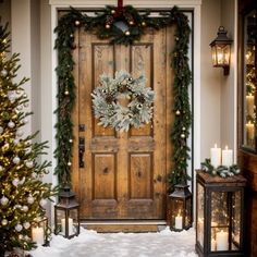 a front door decorated with christmas wreaths and lights