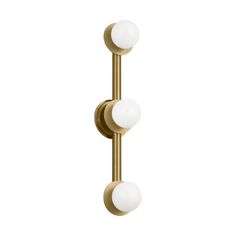 two white balls are attached to the handle of a brass - plated wall light