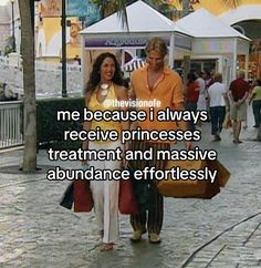 a man and woman walking down a street holding bags with the caption, me because i always receive princesses treatment and massive abundance effortlessly