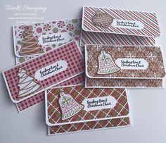 four christmas cards with different designs on them