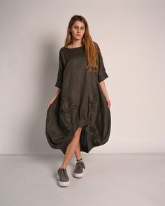 ☀  SUMMER extravagant dress Dark green  summer 100% linen dress. Casual new fashion trend.  Amazing summer dress. Comfortable and unique. Linen dress with big pockets. Fabric: 100% Linen Color: Dark green The dress is available in a very wide variety of colors. All clothes are handmade. 💨 EXPRESS SHIPPING Leave your phone number for couriers. Express shipping 2-3 days with DHL. https://www.etsy.com/listing/713478996/ ◾ If you would like any changes related to the garment, please contact us. Ple Green Linen Dress With Relaxed Fit For Vacation, Green Relaxed Fit Linen Dress For Vacation, Spring Khaki Linen Dress, Casual Khaki Linen Dress, Summer Lagenlook Linen Dress, Spring Beach Linen Dress With Asymmetrical Hem, Spring Olive Linen Dress, Asymmetrical Hem Linen Beach Dress, Beach Linen Dress With Asymmetrical Hem