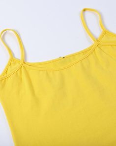 Details: Yellow cami top with meme and strawberry graphical printTop Length: CroppedSleeve Length: SleevelessMaterials:95% Polyester + 5% Spandex Trendy Seamless Cotton Camisole, Y2k Style Fitted Cotton Camisole, Trendy Seamless Cotton Tank Top, Casual Tank Top With Spaghetti Straps, Casual Stretch Tank Top With Spaghetti Straps, Trendy Cami Vest Top, Fitted Casual Summer Camisole, Y2k Tank Strap Tops For Spring, Basic Cotton Camisole For Spring