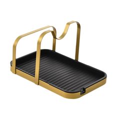 a black and gold serving tray with handles on the bottom, in front of a white background