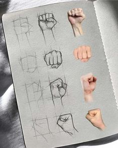 an open book with various hand gestures drawn on it