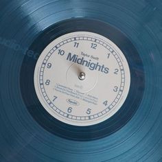 a blue record with the words 10 midnights on it