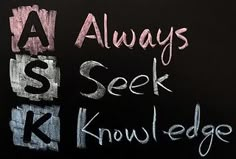 chalk writing on a blackboard that says always, seek, know, and knowledge