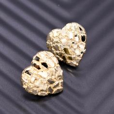 Here's a Nugget Earrings. From our Earrings Collection, this 10kt Solid Yellow Gold 3/4" Heart Shaped Nugget Earrings features Shiny & Diamond-Cut finish. Product Details: Metal: Real Solid 10kt Gold Weight: 3.15 grams Length: Just over 3/4" = 19mm Width: Just under 3/4" = 18mm Bail/Clasp: Push Back Golden Nugget Earrings, Gold Heart Nugget Earrings, Classic Luxury Nugget Jewelry, Heart Nugget Earrings, Gold Heart Earrings Diamond Cut Gift, 14k Gold Diamond Cut Heart Earrings, 14k Gold Earrings With Shiny Finish For Anniversary, 14k Gold Shiny Finish Earrings For Anniversary, Anniversary 14k Gold Earrings With Shiny Finish