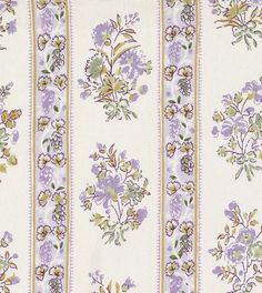 a white and purple striped wallpaper with flowers on it