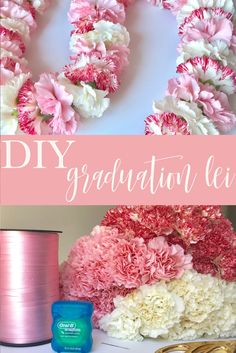 pink and white flowers are arranged in the shape of a wreath on top of a table