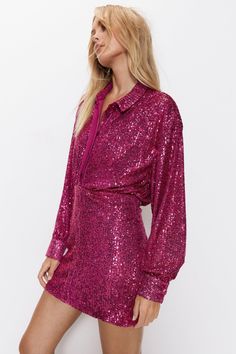 All-over sequin embellishments add glamorous texture 
 Relaxed fit with button front fastening 
 Mini length with bishop sleeves 
This sequin shirt dress from Warehouse is an eye-catching choice for a night out. The all-over sequins create a glamorous, light-reflecting texture that demands attention. Cut in a relaxed fit with a button front fastening, the mini length shows just enough leg while the bishop sleeves provide coverage for the arms. 
Style this sparkling sequin dress for the club or drinks with strappy high-heeled sandals, as pictured. The straight silhouette skims the body in all the right places while allowing natural movement. For accessories, opt for a minaudière and chandelier earrings to complement the shimmering embellishments. With just the right amount of dazzle, thi Dress For The Club, Knee Length Evening Dress, Sequin Shirt Dress, Dresses Sequin, Natural Movement, Sequin Shirt, Long Sleeve Evening Dresses, Puff Sleeve Dresses, Knee Length Dresses