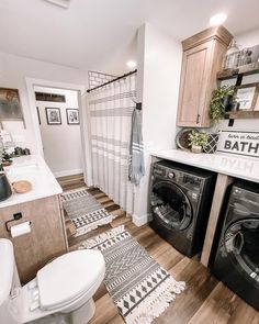 a washer and dryer in a small bathroom