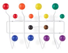 a rack with several balls on it and one ball in the middle, all different colors