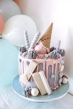 a birthday cake with ice cream and decorations