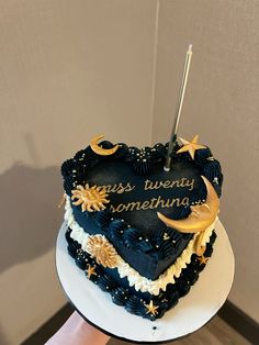 there is a heart shaped cake with the words miss twenty something on it and stars