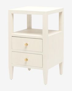 a white night stand with two drawers on each side and gold knobs at the bottom