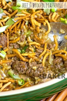 beef and broccoli casserole in a green bowl with chopsticks