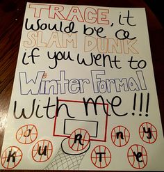 a sign with writing on it that says, trace it would be slam dunk if you went to winter formal with me