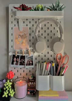 Colorful, cute, minimalist ikea pegboard organization with Etsy duck print, Sony headphone, Polaroids, succulent lego, ikea candle, and ramen shop Lego. Desk organization. Skadis Pegboard, Ikea Pegboard, Ikea Skadis, Zimmer Diy, Uni Room, Desk Makeover