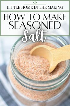 a mason jar filled with homemade seasoning sitting on top of a table