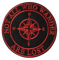 a red and black patch with the words, all who wander are lost on it