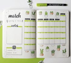 an open planner with cactuses and potted plants on the pages, next to a pencil