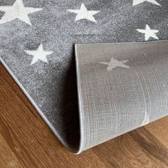 a rug with white stars on it