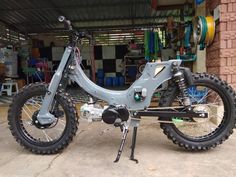 a dirt bike parked in front of a building