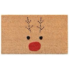 a door mat with a reindeer's face painted on it